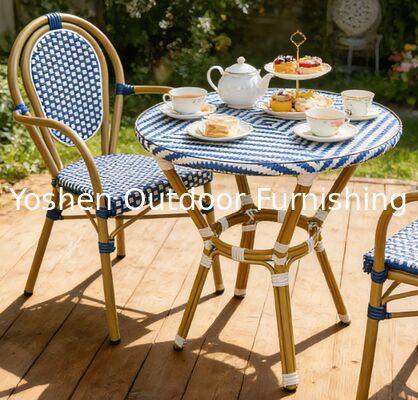 Mesa redonda de comedor de 4 asientos de ratan de aluminio con tapa de vidrio Restaurante de puerta delantera Tienda de café